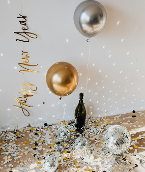 New Year's Eve celebration with champagne and confetti